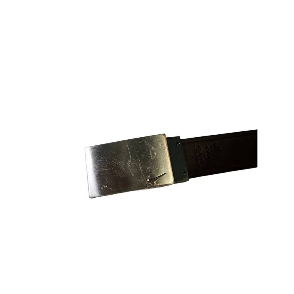 Nike Golf black belt, with silver buckle. Size 34.